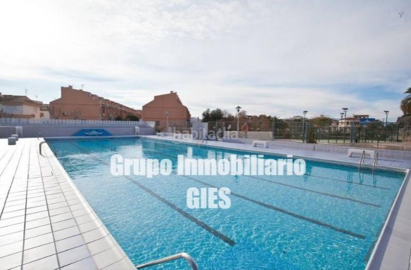 Foto 2897ad9d-bbd5-4e98-a3d0-eb3e4d20be34. Maison jumelée dans calle mar blau n-09 18 dans Mareny Blau Sueca