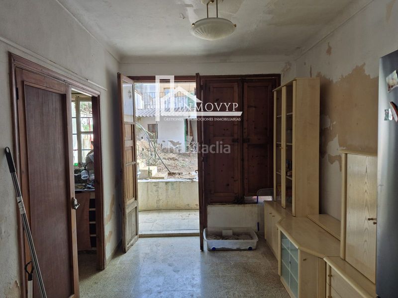 Foto f64fa958-e841-4b07-a4a5-27aeef1098c9. Casa adossada a Gran Via de Colom Inca