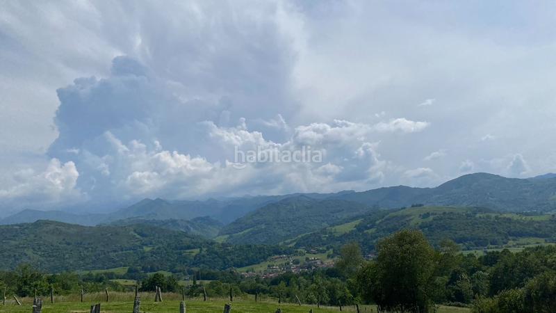 Foto 5cebfa1b-92d2-4014-9e62-a843ef79c894. Terreno residencial finca parcelable con vistas a picos de europa en Cangas de Onís