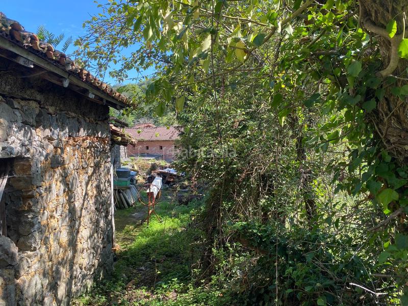 Foto 910a7645-8112-4828-9218-a6e080dbbfff. Casa conjunto de 3 cuadras con terreno en Parres