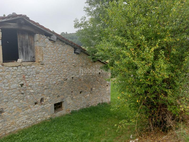 Foto 3d71494c-aeea-42f2-8bb9-4aa0dd98bb14. Casa cuadra que admite cambio de uso a vivienda en onis en Onís