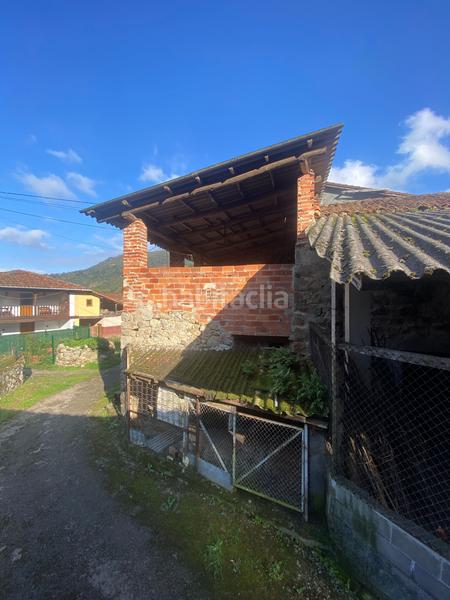 Foto 93ac18a0-eb6d-46c6-8bd3-7c7c47f27d24. Casa adossada a Parres