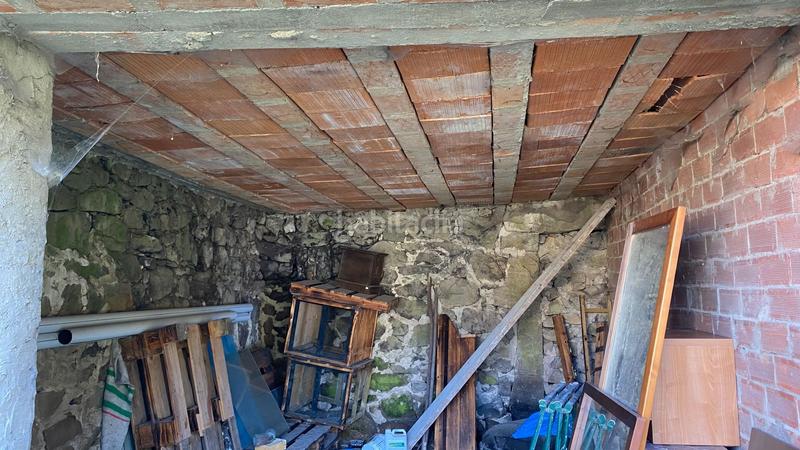 Foto c70ccd5b-a10f-4876-a59c-d24c04bf6ed6. Casa adossada a Parres