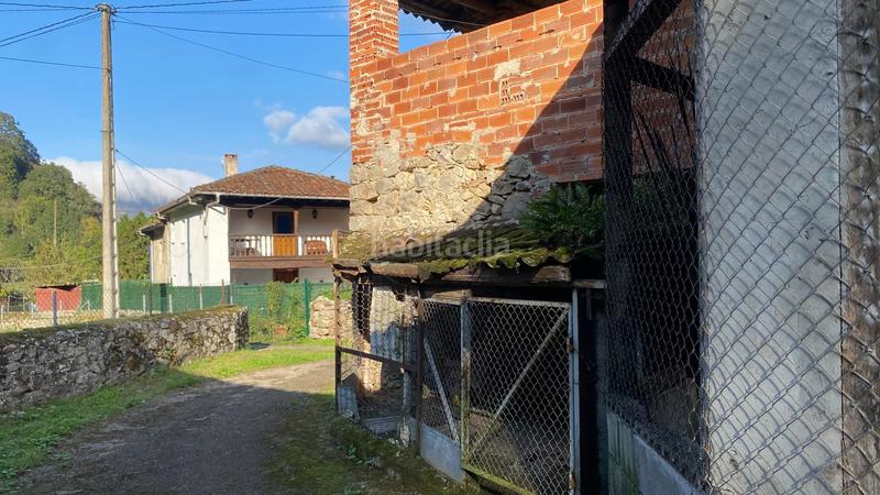 Foto d9f4c0f7-ff38-44b1-9d45-bb5a8e998893. Casa adossada a Parres