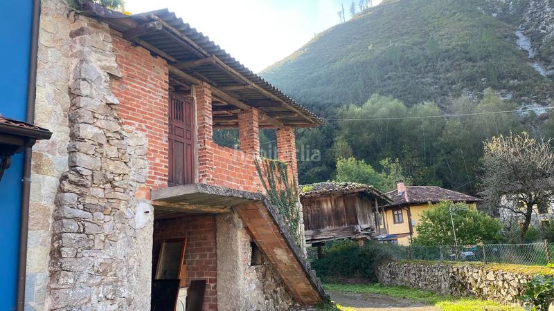 Foto eef0973e-d076-4c74-8df8-4a09620be37e. Casa adossada a Parres