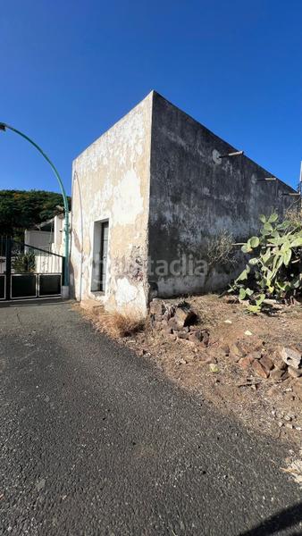 Foto d7ff08e2-174c-4cc9-b431-be3b3bc7a684. Terreno residencial parcela situada en lomo guinea con una construcción. en Telde