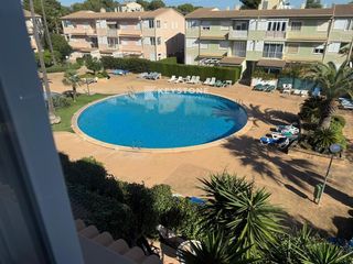 Flat  N/a. Piso con terraza, piscina y garaje en residencial sa coma