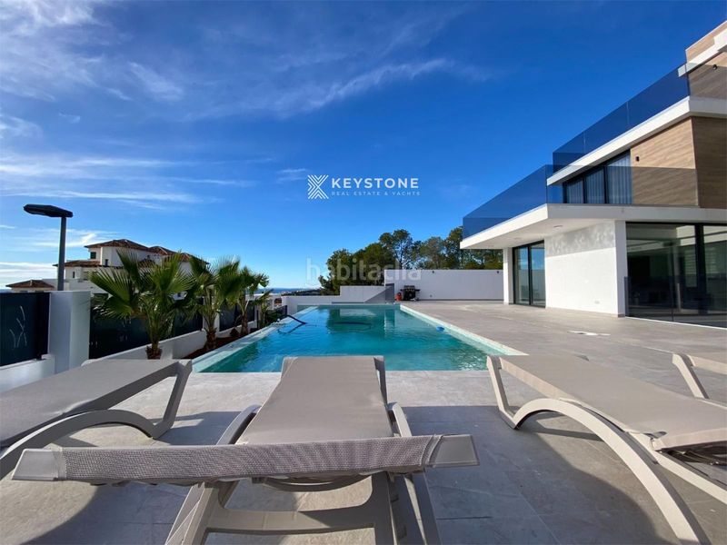 Foto 5bd5cdd9-a13e-460c-99cb-eb5c647cb04a. Casa amb calefacció aparcament piscina a Golf Bahía Finestrat