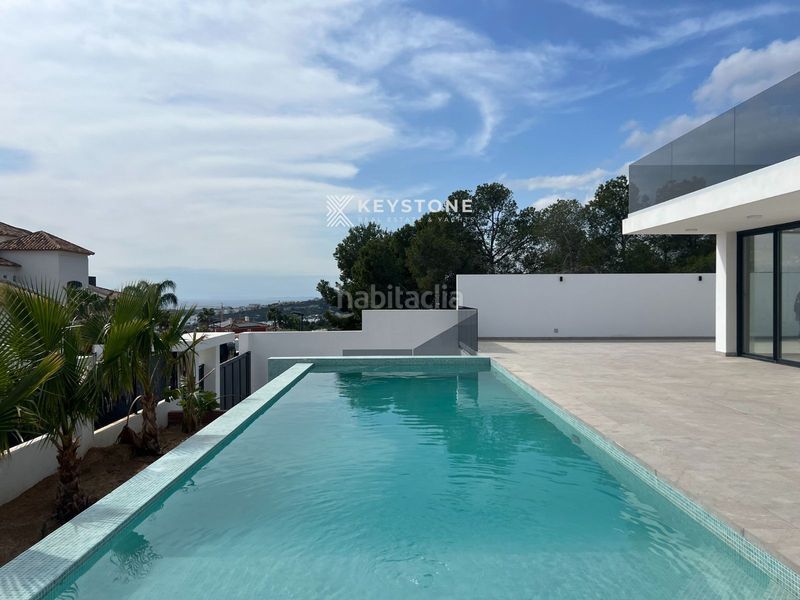 Foto 9a0a9a56-ec74-40df-8f6e-bfb8788dc885. Casa amb calefacció aparcament piscina a Golf Bahía Finestrat