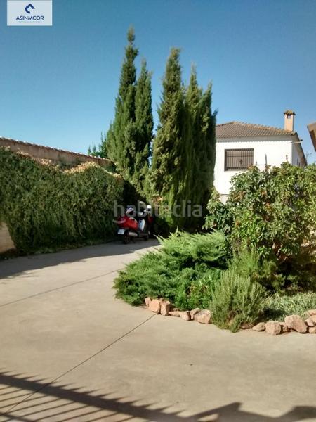 Foto 6ae16ab3-c52a-41ab-90ea-fefb8cc48942. Chalet avec parking dans Alcolea Córdoba