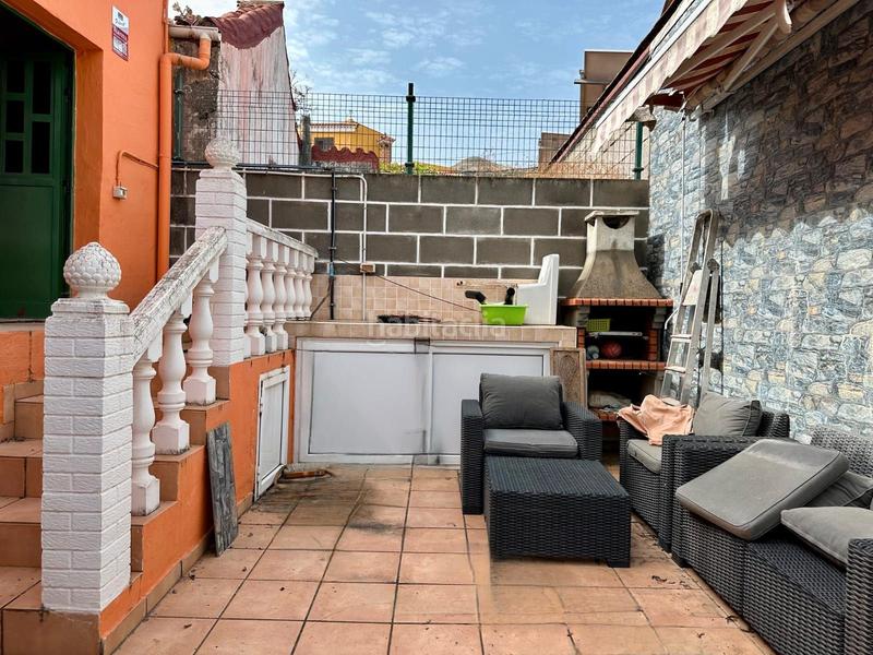 Foto 48184a85-e878-4518-affa-150a36845d8f. Casa a schiera con parcheggio in Vega de San Mateo