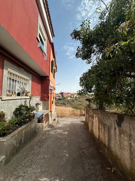 Foto 87ce2860-22e3-490c-bda2-5f78cf48b165. Casa a schiera con parcheggio in Vega de San Mateo