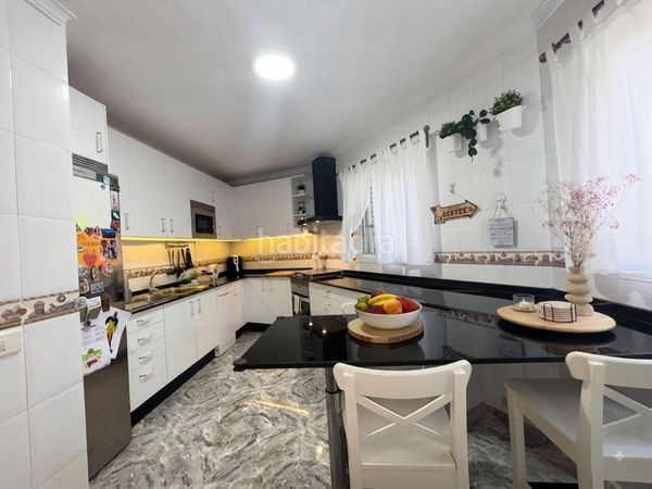 Foto c6455a4f-143b-4b36-a790-59ed7cca5f43. Casa adossada amb aparcament a Santidad Arucas