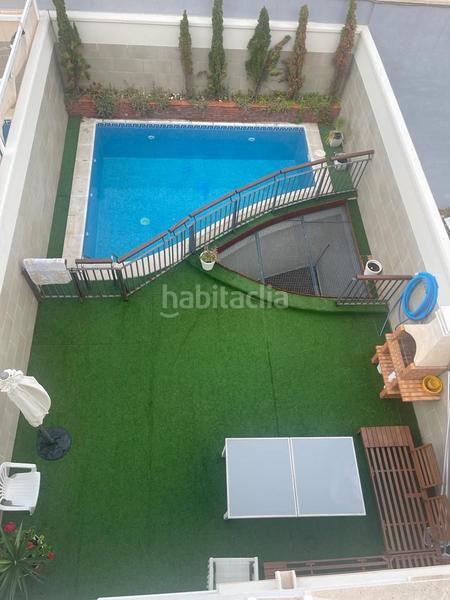 Foto 62d6c067-7605-4111-95a2-e42f8d62327b. Maison jumelée avec parking piscine dans Constitución Melilla