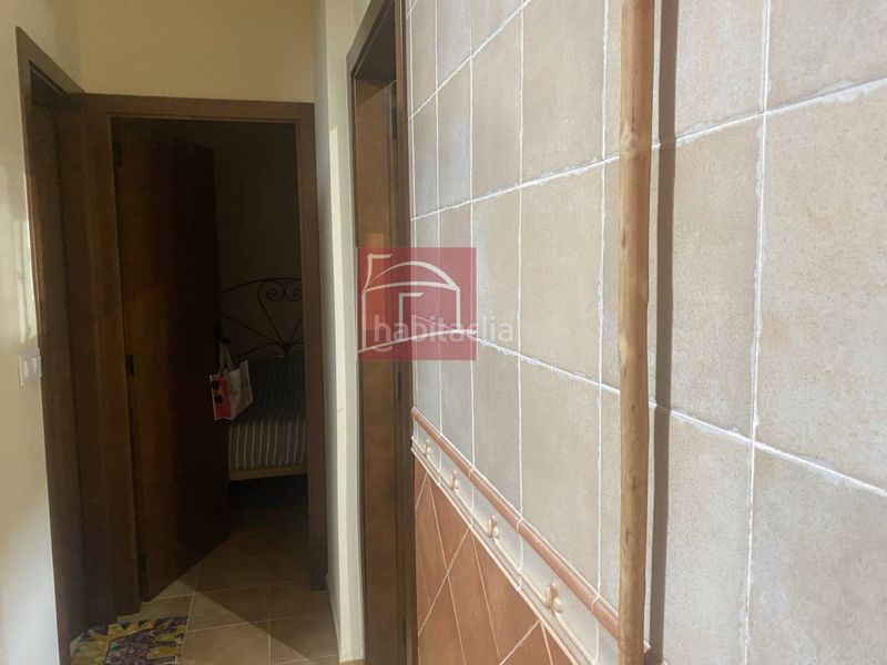 Foto 1117c7b8-02aa-4863-9d79-94cbc163aaaf. Casa adosada casa en urbanización con piscina y zonas ajardinadas en Villanueva de la Serena