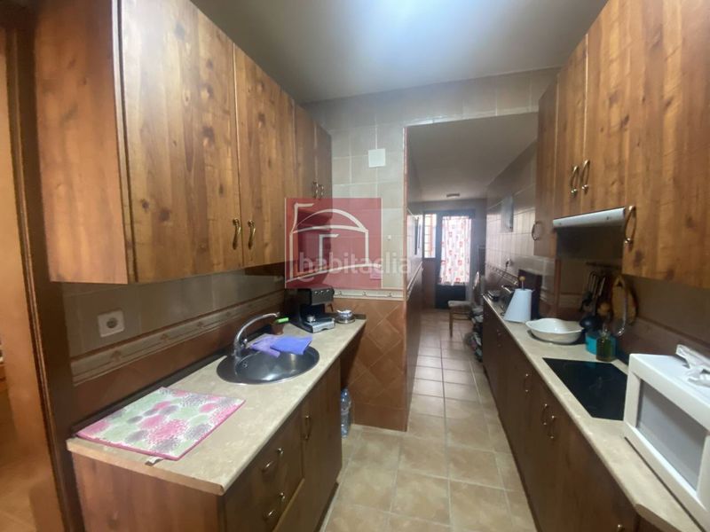 Foto b537fd09-0b7b-40fe-8cdf-061b25ae46cc. Casa adosada casa en urbanización con piscina y zonas ajardinadas en Villanueva de la Serena