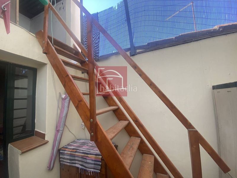 Foto d022932e-2f16-4b47-b5d5-1df7cb5dc856. Casa adosada casa en urbanización con piscina y zonas ajardinadas en Villanueva de la Serena