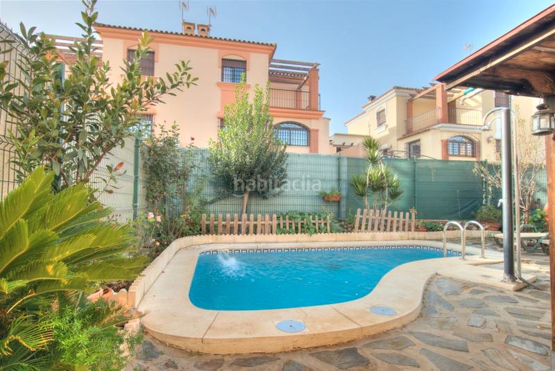 Foto 88c4fc9f-8ccf-4a09-a6cb-ac16507670e8. Chalet casa pareada con piscina en Centro Alhaurín de la Torre
