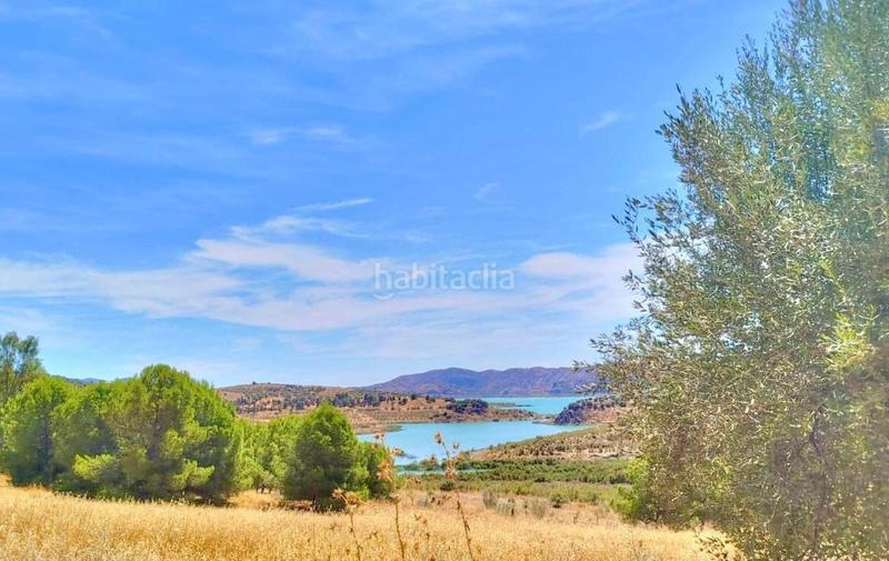 Foto 169f0eeb-dc9e-438b-9389-bbcf4ca0d379. Finca rústica terreno urbano en primera línea con vistas al pantano de la viñuela en Periana