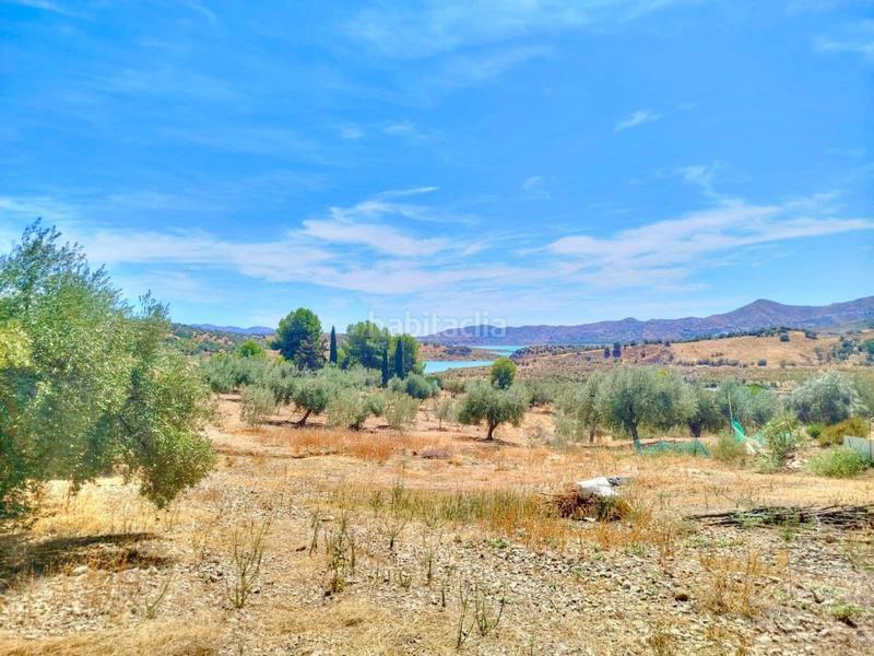 Foto e53de015-dfc0-4259-a179-c328f6b6f686. Finca rústica terreno urbano en primera línea con vistas al pantano de la viñuela en Periana