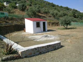 Rural plot in Comares. Parcela de terreno vallada por 2 lados con un trastero de 13m2,