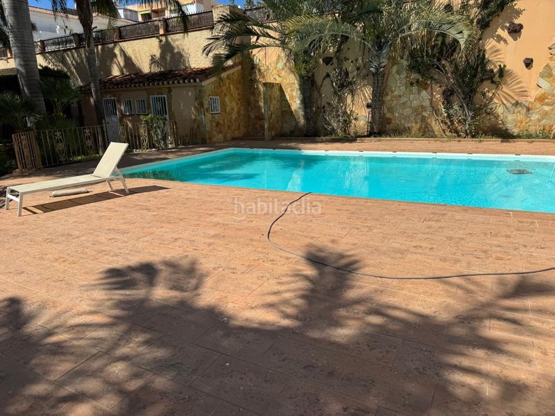 Foto b7cd8c2e-4d2a-497e-ba63-182eeec9802d. Affitto casa con parcheggio piscina in Los Álamos Torremolinos