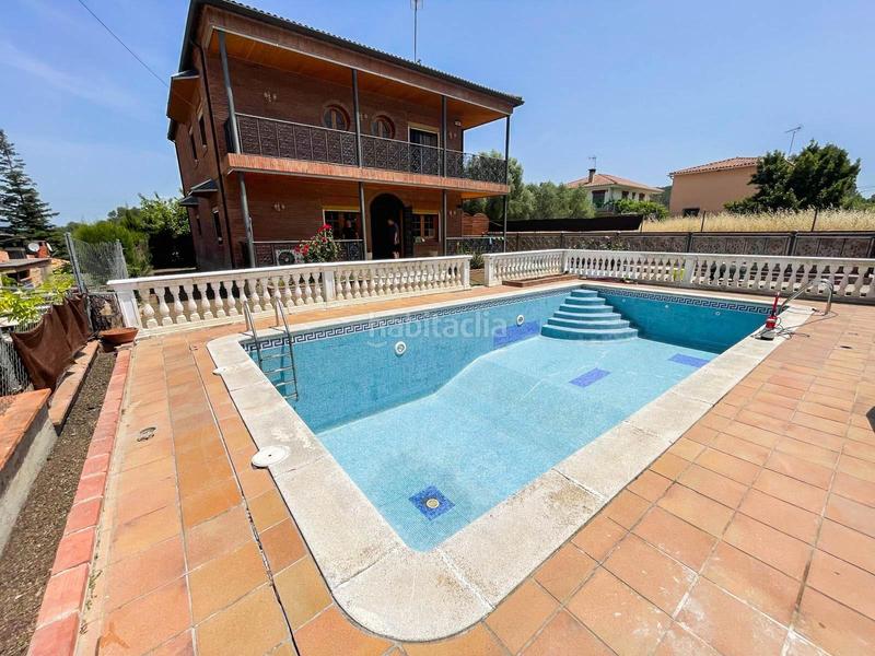 Foto f031703e-c899-4008-9b9c-6c6e8a6179e7. Chalet con riscaldamento parcheggio piscina in Masquefa