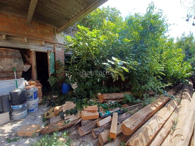 Foto c619c0f2-c3d3-4ae0-a87d-4462c66f8c56. Masía casa de pueblo en venta a reformar en Calafell poble Calafell