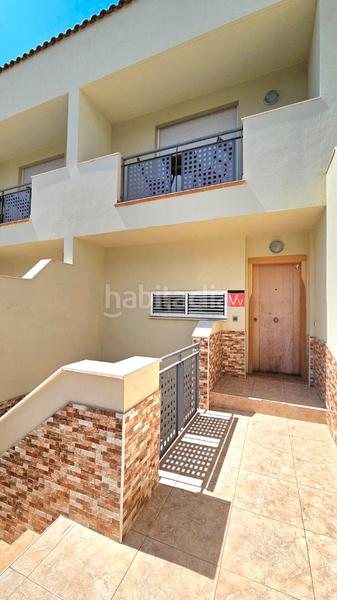 Foto 1deaedc1-2468-49bd-bd21-8ad52b22dbdd. Casa adossada amb aparcament piscina a Playa Fañabé Alto Adeje