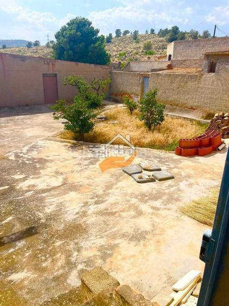 Foto 3bb4679e-4888-4021-bd49-846cd89799ee. Casa amb aparcament a Abanilla