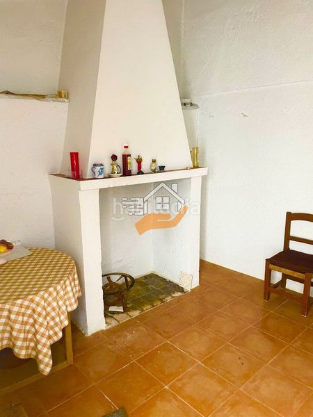 Foto 9f692d99-10d9-4c55-9649-bd50b1bb7468. Casa adossada a Vélez - Rubio