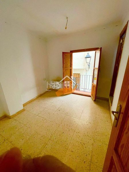 Foto f7890f8d-9b4b-4bb2-bcf0-1a51ae77b50a. Casa adossada a Vélez - Rubio