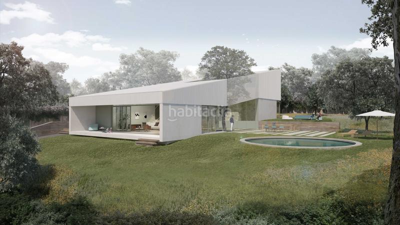 Foto 73f46aa5-d212-46c0-b4fe-bb9ef5dd2b80. Casa con riscaldamento parcheggio piscina in Urbanización Este-Montepríncipe Boadilla del Monte