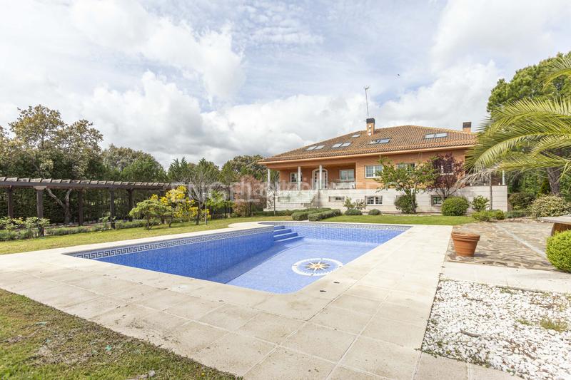 Foto 5d866604-046d-40a5-8a06-69bdb14eaeab. Casa amb calefacció piscina a Navalquejigo-Los Arroyos Escorial (El)