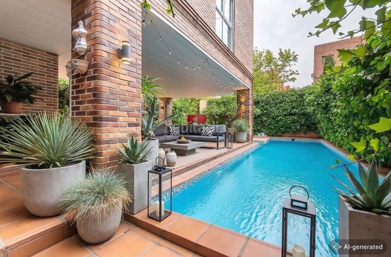Foto 70879b58-898a-4e20-a4b1-be7dce838cf7. Casa amb calefacció aparcament piscina a Concepción Madrid
