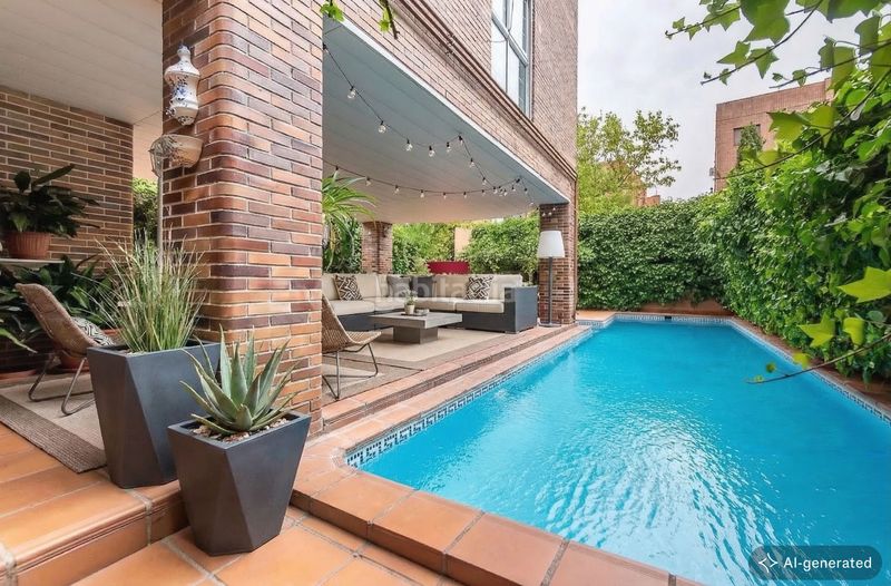 Foto 8a7ae2f5-2284-451a-840e-e7078ac8c679. Casa amb calefacció aparcament piscina a Concepción Madrid