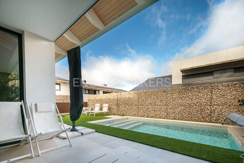 Foto 51e1d277-927f-4ae2-a467-4d2d57a507bf. Casa adossada amb calefacció aparcament piscina a Boadilla del Monte