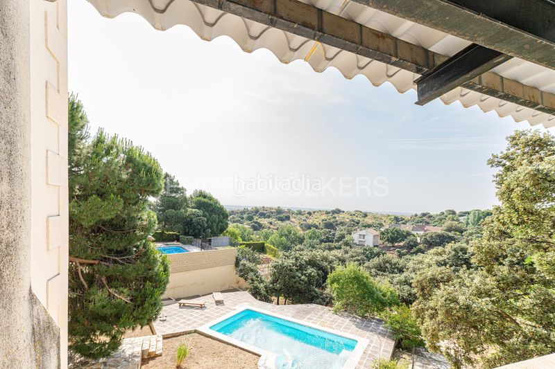 Foto e92f0a1e-d0fc-48ce-b70f-cf0f3cc075ac. Casa amb calefacció aparcament piscina a Pino Alto-Navarredonda Valdemorillo