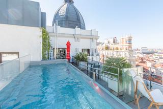 Apartamento en Universidad-Malasaña. Exclusivo oasis urbano con piscina privada en gran vía, madrid