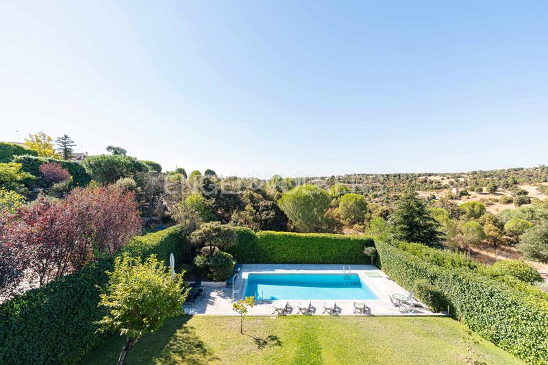 Foto 0f2458c2-d93a-424e-9053-e9f672870b3d. Maison avec chauffage piscine dans Hoyo de Manzanares