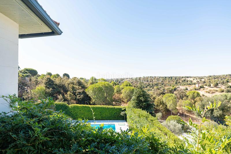Foto efa66d4a-c528-47bb-bf06-b7777f49ab2a. Maison avec chauffage piscine dans Hoyo de Manzanares
