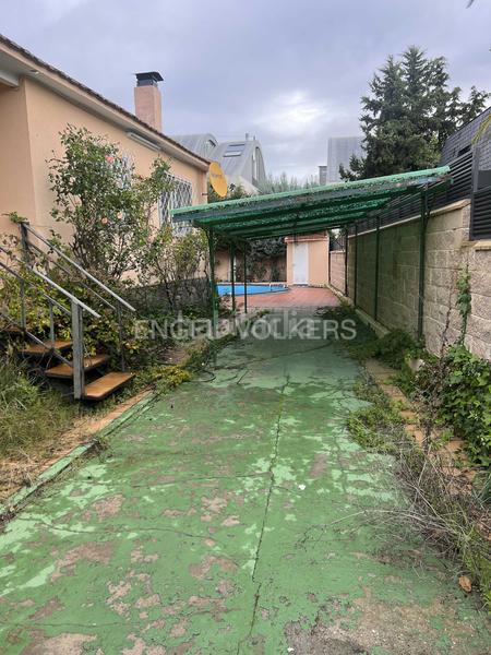 Foto 284a7a44-9e54-4d83-83da-364ce170c6c4. Casa con riscaldamento parcheggio piscina in Pueblo Pozuelo de Alarcón