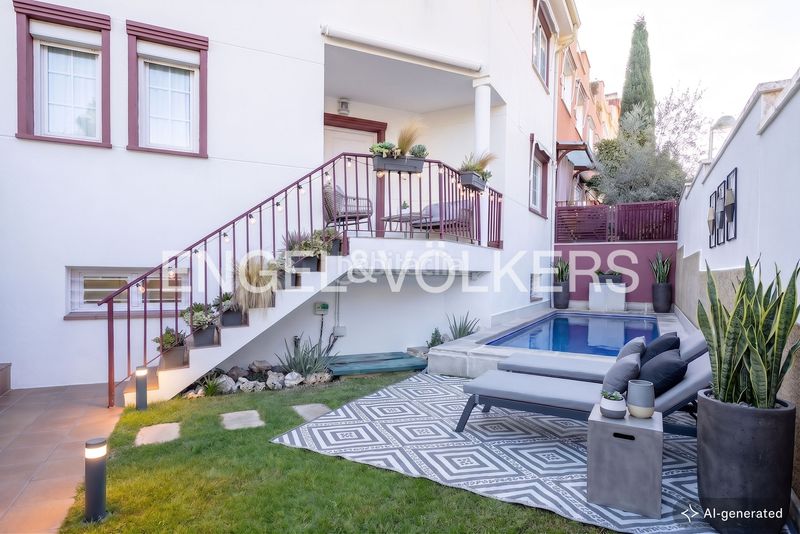 Foto 5d7cd74f-c0cb-4ab3-bce5-d4b41ecfb5fe. Casa amb calefacció aparcament piscina a Corralejos-Campo de las Naciones Madrid