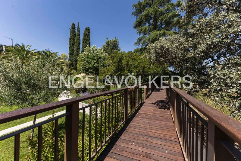 Foto fc927a1f-976d-4f11-8b56-65cd35532d86. Casa amb calefacció aparcament piscina a La Florida - El Plantío Madrid