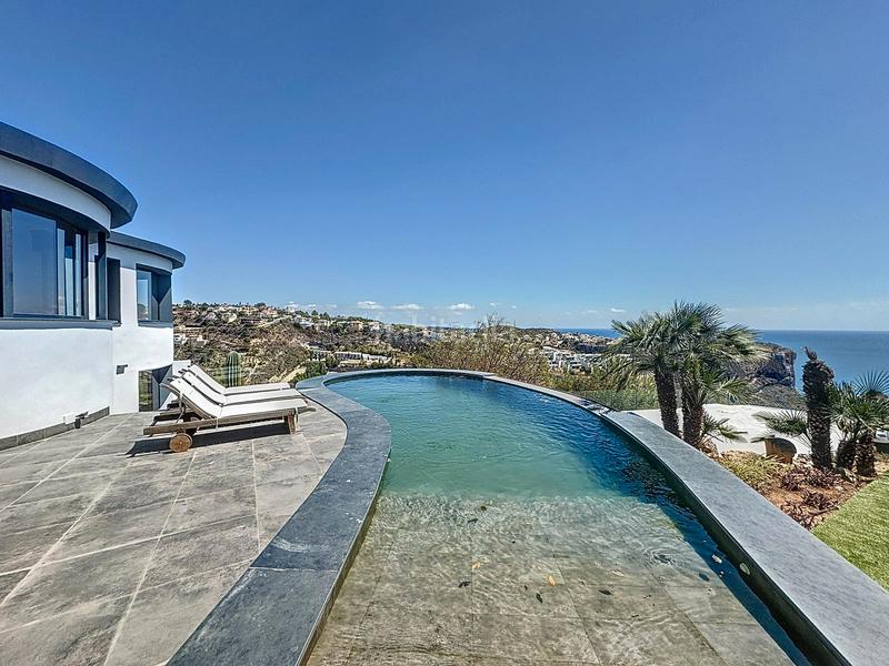 Foto 8cde8a3b-ecc4-4fa0-b594-cb198140db33. Chalet mit parking pool in Cumbre del Sol Poble Nou de Benitatxell (el)