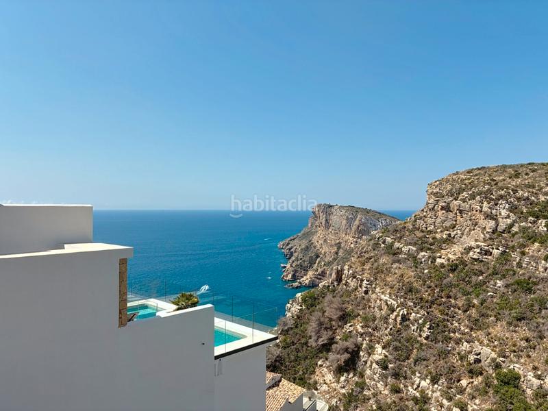 Foto d42e4b9b-811c-41ee-b2f9-cfd89aeea774. Chalet mit parking pool in Cumbre del Sol Poble Nou de Benitatxell (el)