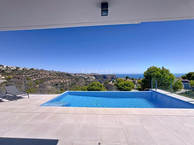 Foto a8af03ef-c6ec-4de3-b50a-43452fc14648. Chalet avec chauffage parking piscine dans Cumbre del Sol Poble Nou de Benitatxell (el)