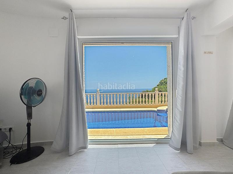 Foto 9c502d6e-cab8-4919-b788-9c47ec19eda0. Chalet con riscaldamento parcheggio piscina in Cumbre del Sol Poble Nou de Benitatxell (el)