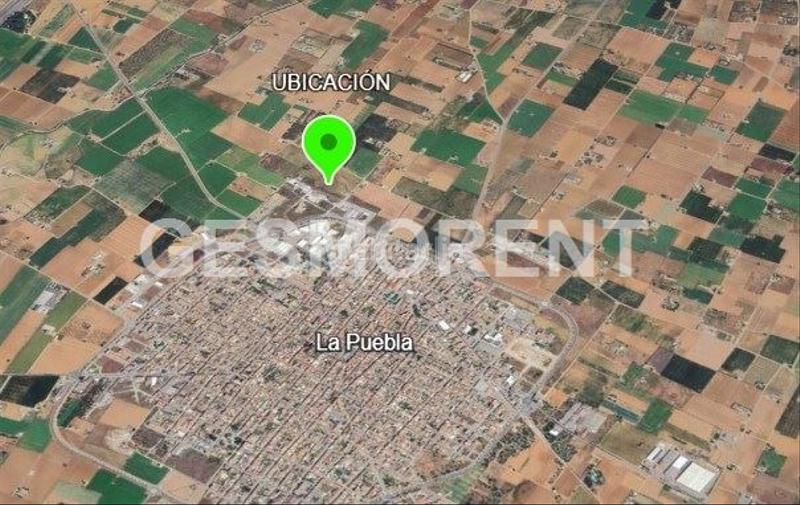 Foto 9863df98-8a35-4fbd-a397-16cd25560ffc. Terreny residencial a Sa Pobla