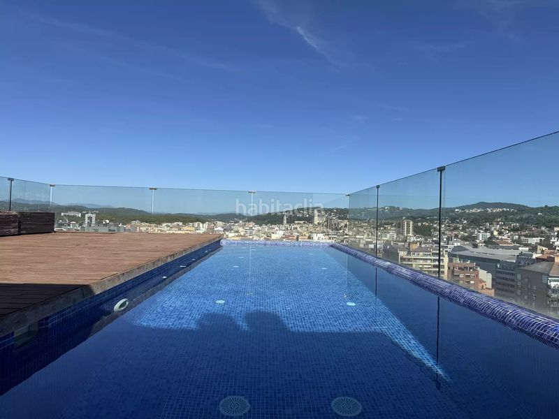 Foto 0277bfbd-5135-4b8c-9c8b-1381cfefad1f. Pis amb calefacció aparcament piscina a Eixample Sud-Migdia Girona